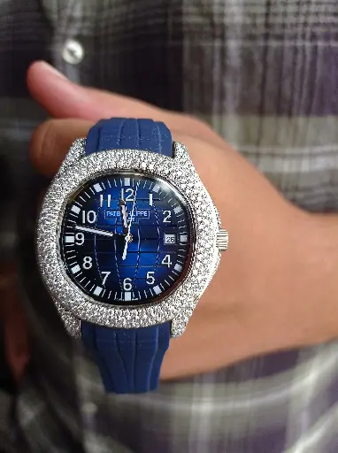 Patek Phillipe Blue dial semi iced out watch with Blue Rubber belt